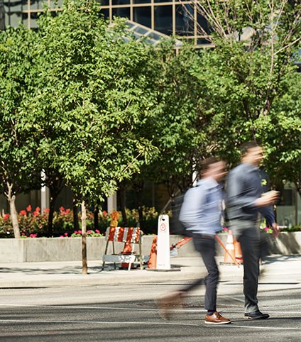 Two men walking in downtown Calgary